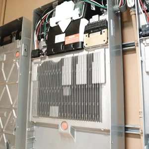 Close-up of residential solar energy system equipment mounted in a garage