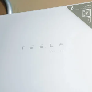 Close-up of a Tesla Gateway unit installed for a residential solar energy system