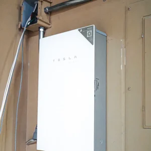 Tesla Gateway mounted on a wall as part of a residential solar power system